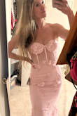 Yes, it drags on the ground due to my shorter height, but it fits really well! It's unique, and the price was right. It's a lot of dress for the price! - Amy M.