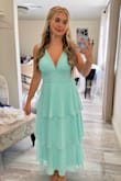 I loved this dress for my best friends wedding in CA! I got so many compliments on it and loved that it was my favorite color. I'm short but I needed a long dress so I ordered a midi and expected it to fit longer on me, and it did. I am usually a XS/S but decided on a small for this dress because I have a bigger bust, I possibly could've gone with a XS though. The only thing I wish was different is that the straps weren't as long because they were a little loose and kept falling down my shoulders. Other than that is was so comfortable and I was able to dance all night! - Melani R.