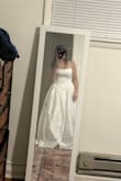 Really nice if you want a cheaper wedding dress. The material looks more plastic like in person compared to the photos, but you can try steaming it. I ended up going with something else, but Lulus has great customer service, so it's worth it to try if you like this style of gown. - Courtney D.