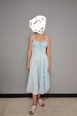 Fits well and is swishy and pretty for casual summer wear. Some cons are that the zipper sticks a bit, it snags somewhat easily, and the straps came permanently twisted. I just throw a denim jacket over it, and it works for my purposes, though. - Rissy H.