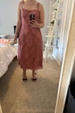 Love this dress, I got the dusty rose and love the color. Dress flows away from the hips nicely and fits well without being too tight. I am 5'5 and this dress isn't really a midi for me, more like full length, hits just above the ankle. I will be wearing tall heels to compensate. Otherwise dress fits well, bust fits fine for me, but I could see it being too small for others. Quality seems good, have not washed it yet! - Alison B.