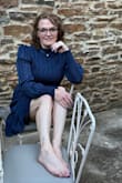 Pictures do not do this dress justice. It has vertical, subtle glitter accents! I felt so elegant in this dress and received so many compliments! It's a must for your closet. - Michele E.