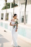 I got this dress for our 10th year anniversary as we renew our vows in Bali. The length was too long, but that's also because I'm very short, so I have to alter it, no big deal. I'm impressed with the quality of the dress. Love the details and I got so many compliments. Love love love this dress!!! - Ovino P.