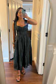 I'm normally a small in Lulus but sized down to XS. (There is some smocking in the back, so allows for wiggle room in sizing). Definitely for smaller cup sizes, but the skirt has a lot of extra material a space! Material is lovely, but definitely needs a steaming - Amanda T.