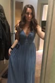 When ordering online, you never know what you're going to get. I took a chance and this dress is beautiful! I live in Canada and received it within 2 weeks (extra bonus that it came so quickly!). It is just as good quality as what you would find in any bridesmaids dress store - which makes me super happy. My hips are much larger than my waist (typically have a hard time finding anything that fits my small waist and big hips) but this dress is perfect for that as it flairs our. It doesn't matter what you are on the bottom, go by waist size when ordering! Can't wait to wear it all night! - Ember R.