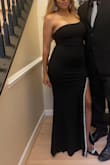 I am 5'4", so definitely had to wear high heels. The length is what makes it elegant, so I cannot complain. A beautiful dress for a nice evening party - Elsa M.