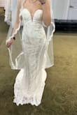 Details on this dress is stunning! My measurements did recommend an xs, but it's a little small through my hips! The inseams on the sides don't leave much room for letting out, and it would be hard to hem with the type of lace on the train. I'm not super tall, so it wouldn't work for me, but I love the dress still! - Jillian F.