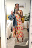 Cool, colorful rayon material which complemented my day out to the Zoo perfectly. The back portion is out, which helped promote a little more airiness (much needed in this August Florida heat) and made the dress even cuter. I paired with some yellow/mustard accessories. With so many beautiful, bright colors in this dress, it's easy to play around and find a color palette to your liking when dressing up. - Talysia E.