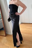 I bought this dress for a black tie wedding, and it was perfect. So figure flattering! I do have a smaller chest, so I'm not sure how comfy it would be if you had more going on, but the top has some decent stretch. The draping in the front is perfect for covering up any bloat and the dress hits right at the ground, so I didn't need to get it tailored, which was a nice surprise. Really a 10/10 dress. - Elizabeth B.