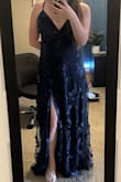 Great formal dress - very pretty in person and plan to wear for multiple formal events. Not made for short people, as usual with long dresses, you will need to get it hemmed. Biggest flaw - followed the sizing guide and purchased XS, which fits well. However, the bust is extremely loose and large. The discordance between the dress itself and the bust makes choosing a size hard, though you can adjust the straps and make it work. I will have to get the bust adjusted along with the hem. - Elizabeth F.