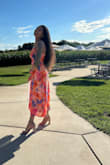I loved this dress so much! I wore it to an outdoor summer wedding and it was perfect. Colorful, flowy and easy to dance in. Fits true to size and comfortable. The back was also a beautiful touch. - Katie L.