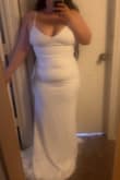 This dress came in and saved the show, I had purchased another dress and then found out I was expecting 3 months before the wedding. I was truly impressed on the quality of the dress it doesn't not feel cheap especially considering the price. The only downside was the straps not as flattering and the only cheap felt part of this dress if ordered far in advance could very easily be changed out. I did also buy a belt to complete the look and give it some bling but I posted a photo without it so you have a true visual of the dress. I am 4 almost 5 months in the photo and I am not wearing any shape wear or bra for reference again I am 5'4 / 197-200 pounds. I'm wearing a size 10 in pants / 32 in Levi jeans if that helps. - Isela S.