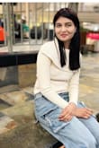 I recently added this white top to my wardrobe, and it's quickly become a go-to piece for both casual outings and dressier occasions. The fabric is soft yet sturdy, and it has a subtle stretch that gives it a flattering fit without feeling too tight. The white color is crisp and clean, making it feel fresh and timeless, though I recommend being cautious with any spills, white is always a bit more high-maintenance! - Haritha D.