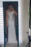 Great quality dress, beautiful fabric. However I think the style of this dress feels a bit dated. I think it would look better on someone who is tall. I wasn't a fan of how it looked on me at all. It also wrinkles soooooo easily which is annoying. - Rhea P.