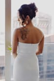 I absolutely loved this dress. I bought it as a back up for my wedding but ended up just using this the entire day without the arm sleeves. So simple and elegant.. just stunning! - SHAYLA L.