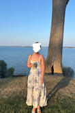 This is a pretty, flattering, and comfortable dress that is not at all see-through. The straps are very long, meaning they can be quite a low cut. I tried to adjust the straps the very first time I wore the dress to raise the neckline a bit, and one of the metal clasps broke in half. The fabric seems like a nice quality. I just wish the clasps were made well, too. My husband had to tie a knot in the strap to keep it in place. I'm hoping Lulu's will send me another clasp or just replace the dress, because I do like it. - Elizabeth M.