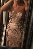 The dress was just like the picture. Fits perfectly without any adjustments. Very comfortable. Material is stretchy and holds up well. I'm am very satisfied with the dress. Highly recommend it. - Jennifer A.