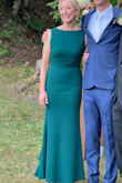 I was the Mother of the Groom and wore this dress, and it was amazing!  I had so many compliments and felt wonderful in it.  It is formal but with some fun, as the back is so unique.  Highly recommend. - Sallee D.