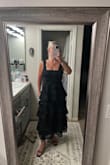 This is the second dress from Lulus I bought for a company party. It's very fun and elegant! I purchased a size medium, and it feels slightly large. There is no stretch to the fabric, so that's something to consider. All in all. It's quite pretty! Get it! - Joanne E.