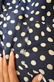 It was love at first sight. However, after just a couple of hours of wearing, the middle seams ripped :(. So disappointing, as I love the color and the fit. - Dionne C.