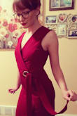 the dress looks like on the pic, it is a nice thick material, I don't think this is a party or a going to the wedding dress, it does look kinda for an office, which I bought it for, because it is long and closed out, so if you are going for a sexy look, ship this dress
but if you want to look decent and formal, it's a good dress
I am an a cup so the v neck runs kinda small on me, I think it would look better on a bigger chested women, and sexier, but overall I am satisfied - Kate O.