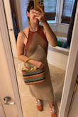 I sized up to a medium based off reviews. I like having something roomy to wear on vacation for when all the vaca tacos make ya bloated. A lot of reviews said it's a weird fit and clings in strange ways. I sort of see what they mean, but I still like it! It's hard to find a beachy crochet look that's actually lined, so felt like a steal to snag this at such a discount. - Davina C.