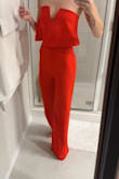 I love this jumpsuit! I wore the white one to my rehearsal dinner and loved it so much I ordered the red to wear to my brother's rehearsal dinner! Can't wait to wear it!! - Gretchen S.