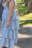 This dress was perfect for me to wear as a guest to a wedding at the end of August. The ruffles and flowers are so pretty on the dress. Loved the bow tied straps and length of the dress as well! - Jordyn L.