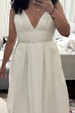 I was looking for a simple but elegant dress for my elopement. I added the belt, also from Lulus. I wear size M but had to size up to XL as it runs small around the waist area. The XL is too big for my cup, so I will get it fixed, as well as the length. Overall, I felt pretty and comfortable after trying this dress on. It did come with a little hole at the seam, but I will get that fixed as well. I recommend you steam it when trying it on! Makes a big difference! - Angie L.