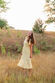 I wanted a summery dress that was fun and classy and this dress was perfect! It matched good with lots of backgrounds. There were a couple loose strings here and there but that was easily fixed. No issues with anything else though! I'd totally recommend for a classy option that is also flowy and cute. - Elizabeth S.