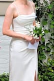 I had a low-key backyard wedding and this dress was perfect for the occasion. The material is soft and did not really require ironing but at the same time, thick enough that underwear was not visible. Ordered both S and M sizes, but S fitted better. Creases on torso works great in masking the belly! Overall, I am happy with my purchase. - Weronika T.
