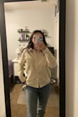 I ordered this top for a new job, and am very disappointed with what I received. The fabric feels cheap, thin, and scratchy. It's see-through as well. The shirt also didn't come as pictured. I ordered the beige shirt, which is supposed to have dark brown marbled buttons. This was a big selling point for me as I liked the contrast. However, the shirt I received had off-white buttons that blended in with the top, removing that contrast and visual appeal. While the fit was decent, I was overall really disappointed with the product, and as someone on a budget, I definitely don't think it is worth $42. My advice: save your money! - Jessica V.