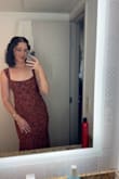 I originally ordered a medium and a large, as I can be between sizes. The fabric had a nice soft stretch to it, so I ended up going with the medium. I never felt uncomfortably tight the whole evening! Would buy this dress 100 times over! - Rylee G.
