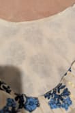 Material was not as soft as I thought it would be. There was makeup on the inside collar, and the zipper was hard to get down and did not want to go back up, even with the dress off. I do not want to try on or keep. - Ericka O.