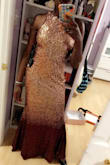 I'm wearing this dress to my junior prom. I was a little skeptical ordering a dress online, but I was not disappointed! The material is not uncomfortable despite the many sequins. It's very stylish and I can see myself wearing this dress again! I love it! - Tammy E.