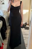 I love this dress! Super flattering and fits so well. The material is stretchy and doesn't wrinkle. I really like the backless look and the straps. - Hannah Z.