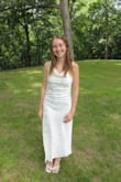 I tried this dress on, not expecting it to fit me well, as nothing ever does since I'm so short. When I slipped it on, I was so happy with the result. It fits perfectly! I wore this dress for my bridal shower and will be wearing it for my rehearsal dinner and on my honeymoon as well! - Kylie R.