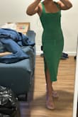 I love the material that Lulus uses on these dresses. Very flattering. I'm short, but I still like the length on me. Fabric has stretch. The straps are too long, but I'll have them taken in a bit. The slit on the side adds a nice touch; it's not that high. Ordered my usual XS and it fit great! - RISS R.
