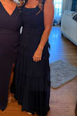 This dress was perfect for a mother of the groom dress (for an evening outdoor wedding), and I received a lot of compliments on it. I felt very feminine and elegant in it. I had to have the straps altered, as I feel like the dress was made for someone with a super long torso. I am naturally super chesty at a 32 H and managed to make this work. It was snug! There is no give in chest area at all. The skirt is amazing and flowy, but very heavy with fabric for lining and skirt. The event was outdoors in Florida, so it was a little hot. That being said, I have no regrets and loved the dress! - Russ B.