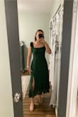 This is my first dress that I have ever purchased online, so I was a little nervous. However, I was not disappointed! When I was reading other reviews for this dress, some of the comments said the straps weren't adjustable, but mine were. Originally, I had tied the straps just like the picture, but found the straps to be a little loose. Instead, I created the dress into a halter top, and it was a success! The material of the dress was comfortable and light, perfect for the wedding I attended. I also got many compliments! Would definitely recommend this dress - Addy L.