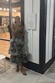 This dress was lovely. Received many compliments and people asking for the dets. Umm, I'm a size small but ordered a medium based on previous reviews recommending sizing up, and I'm glad I did since it worked out nicely. - Jourdan M.