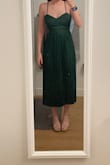 I love this dress! The length and cut were perfect! However, the dress doesn't have any stretch when it comes to the bust area. I didn't have any major issues - just something to be aware of when ordering! - Mairead S.