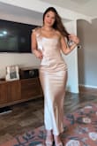 I love this dress! I got it for a formal wedding I have in October. Love the shimmer! I ordered a size Small. I normally wear small or medium in Lulus. Heads up, there is zero stretch & if you're extra blessed in the chest, this might not be the dress for you. - Taylor B.