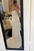 I am obsessed with this dress. I love the detailing all over, especially the stitching that is similar to macrame look. It's perfect. I originally ordered a medium, but it felt way too large. The small is better, but I'm taking it to a tailor tomorrow to get their opinion. - Emily R.