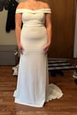 This is such a pretty dress, LOVE the buttons! It was a bit tight on me. I'm typically a medium, and that's what I ordered, but it wasn't flattering on my body. I loved the style though! - Peyton W.