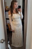 I knew I wanted a long sleeve lace wedding dress. 
This is the perfect lace detailing, and the comfortable lace! Not the itchy stiff lace! The dress has a grippy along the top of the bust to keep it in place, and I only wear nipple cups under it, and it holds in place well! 

It is not structured, so it does show your body form. Shapewear is an easy resolution! It's not a super long train, but just enough to show that there is a train. I love how it hugs my body and is super flattering. 

The layer underneath is beige, and it is an off white, not a true white. So keep that in mind. 

All in all, I am so excited to wear this for my wedding!!! - Gretchen H.
