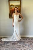 Out of 4 dresses I ordered, I loved 3! This was my final choice for a small backyard/country wedding. It fit perfectly, curving around my butt. No alterations needed. It will also be very comfortable to wear. I didn't care for the back strings tied in a bow and hanging. I tucked them inside the dress at my hips and will probably wear it that way on my day. - Jessica L.