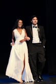 I wore this dress to my senior prom and I loved it! It fit really well. The only thing is that I had the v in the front sewn up a tiny bit, just because it was a little low for me, also it was pretty long even with heels I had to hold the dress up when I walked. Other than that it was the perfect dress (great for dancing!) - Asia C.