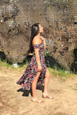 I absolutely love this dress! It is incredibly comfortable and breathable. I am just under 5'2" and it was a perfect length! The thigh slits were still at a sexy height too! I couldn't find the tag for washing instructions but a cold delicate wash & laying flat to dry worked perfectly! - Arely S.