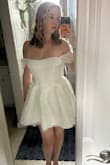 I bought this dress because it looked like a longer version of the Selfie Leslie one and I'm tall and I'm obsessed! It is actually long enough but doesn't look frumpy because the back is longer than the front. The fabric feels high quality, and the sleeves don't stretch but are so cute, and I'll put them under my arms if I want to dance in it. I'm going to wear this for my engagement shoot and probably my reception - Jacqueline S.
